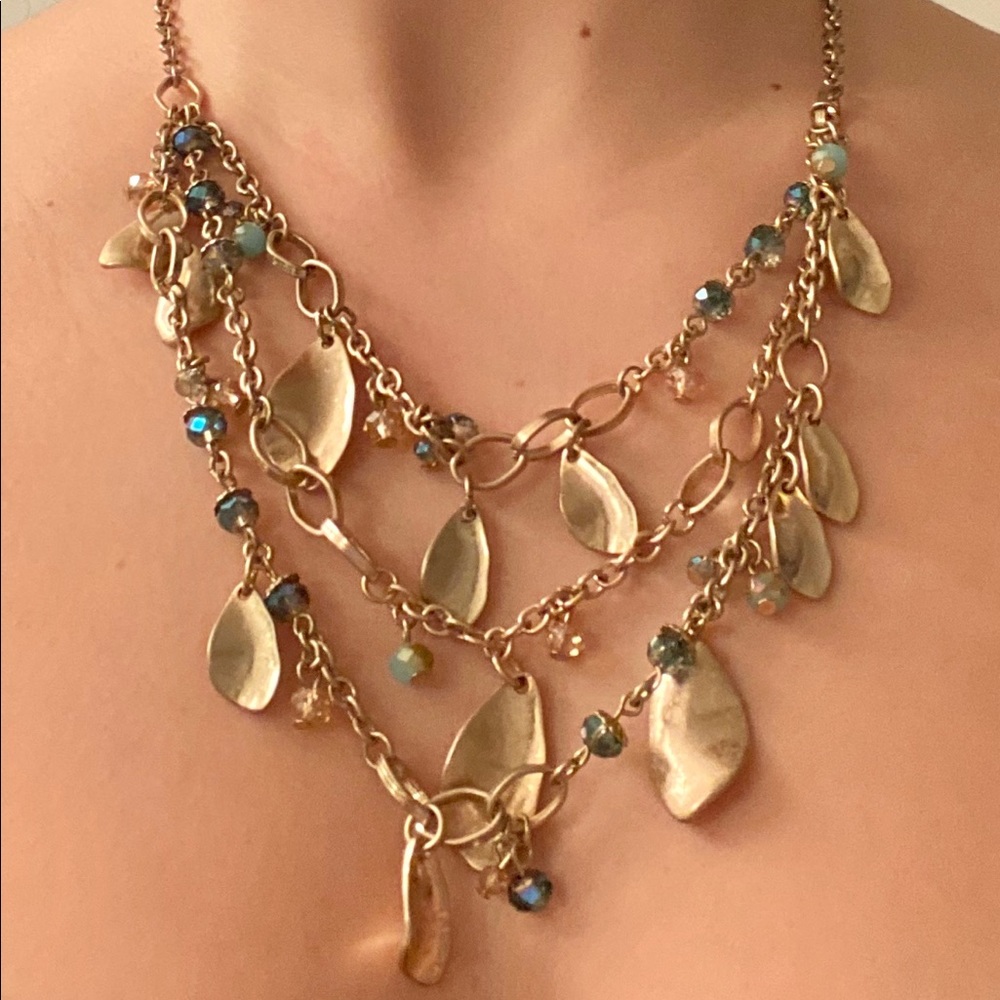 Layered gold chain necklace with beaded detail
